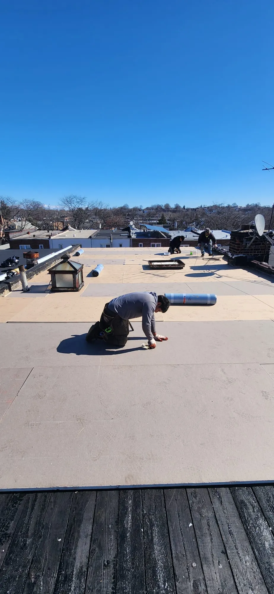 New flat roof replacement with durable materials