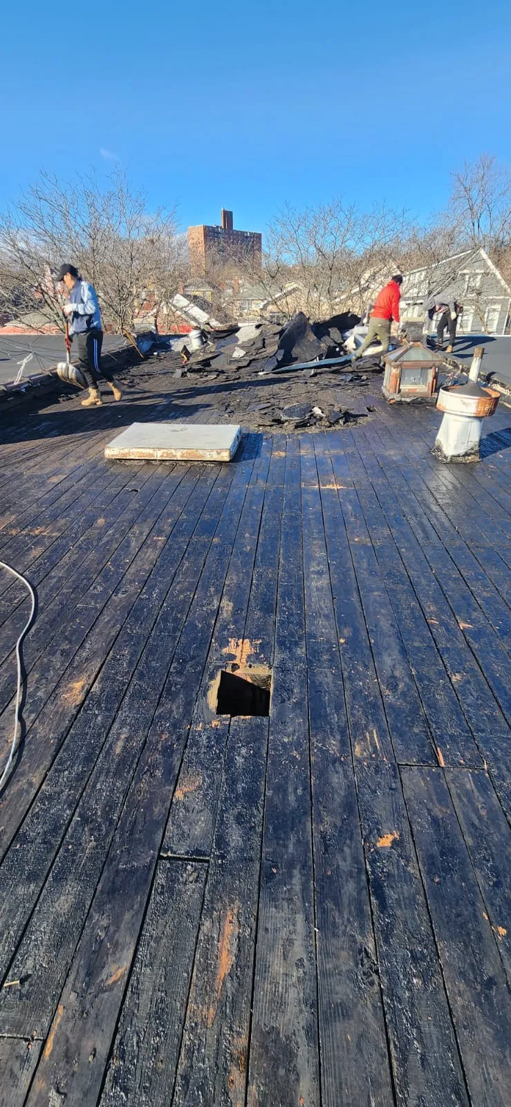 Roof replacement work in progress in Bronx NY