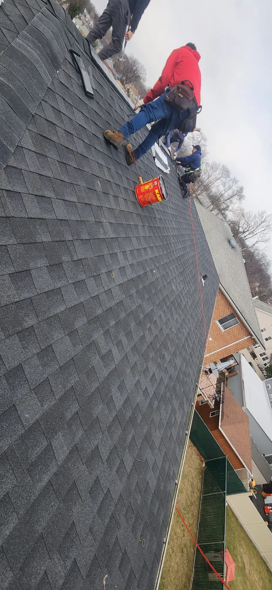 Shingles roofing repair work in progress